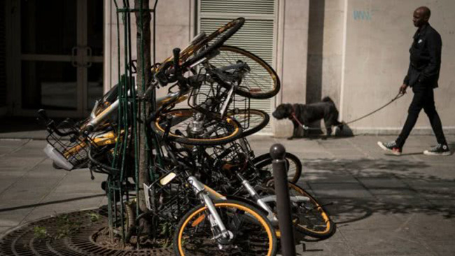 路透社评论：共享单车到底是绿色革命 还是城市蛀虫？